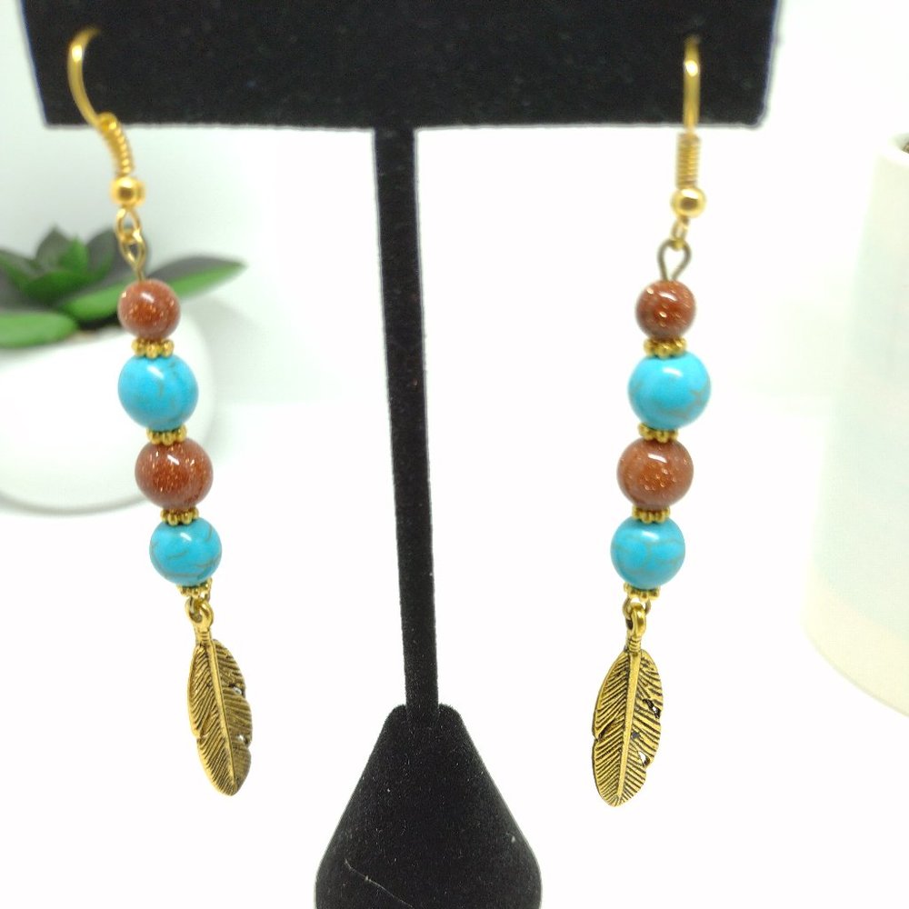 Gold Sandstone and Faux Turquoise Dangle Earrings with Antique Gold Feather